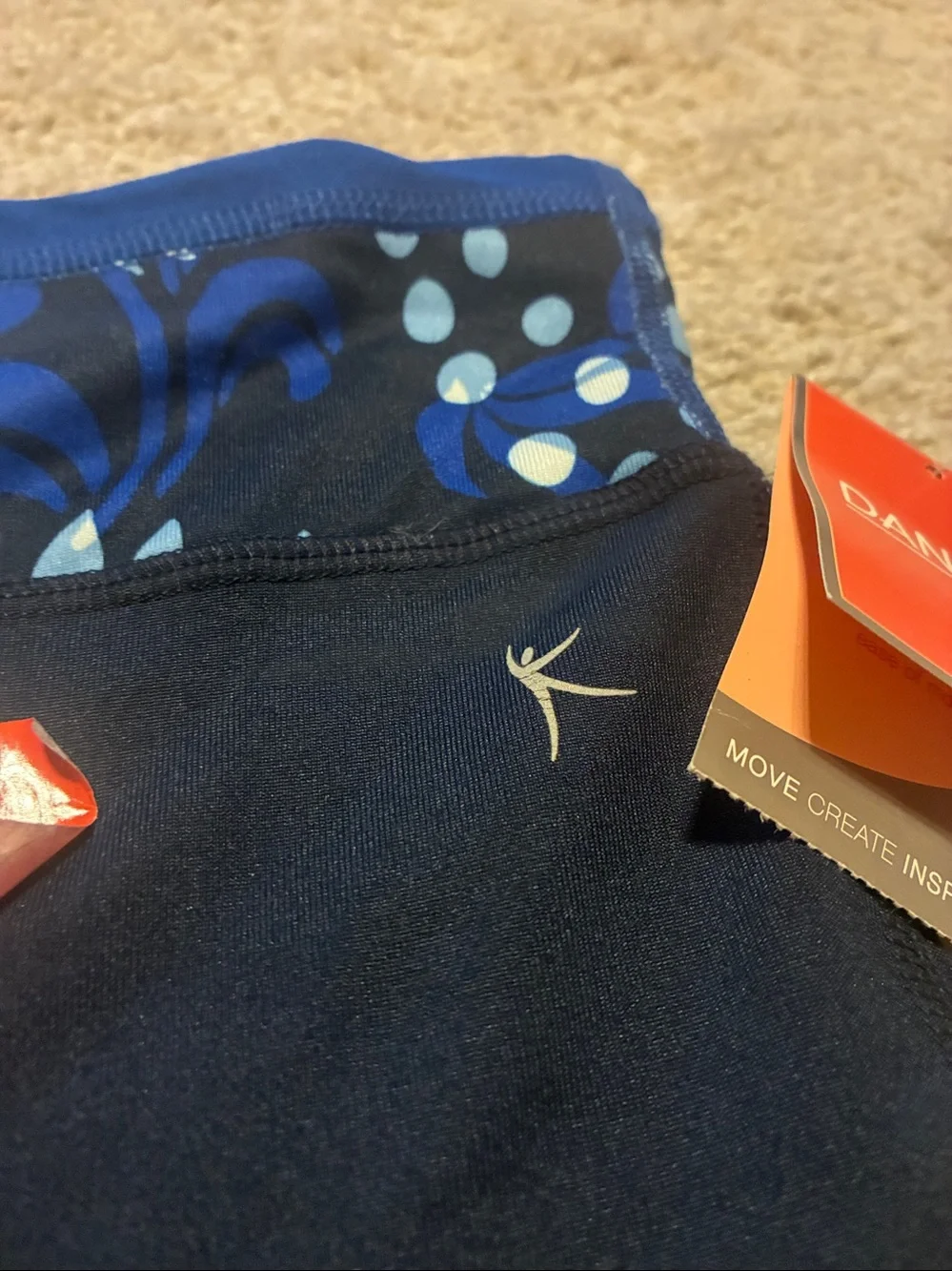 Reversible Danskin Now Yoga Navy Capri Leggings with Blue Patterned Waistband